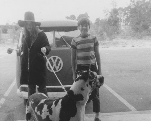 Rachael in her teens with her Great Dane, in a wide-brimmed hat