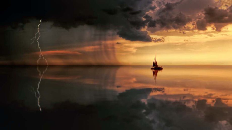 A tall ship at dawn